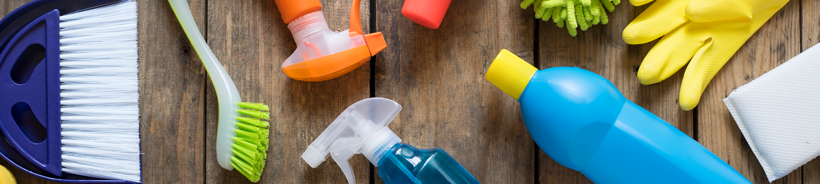 Assorted cleaning products laid out on the floor