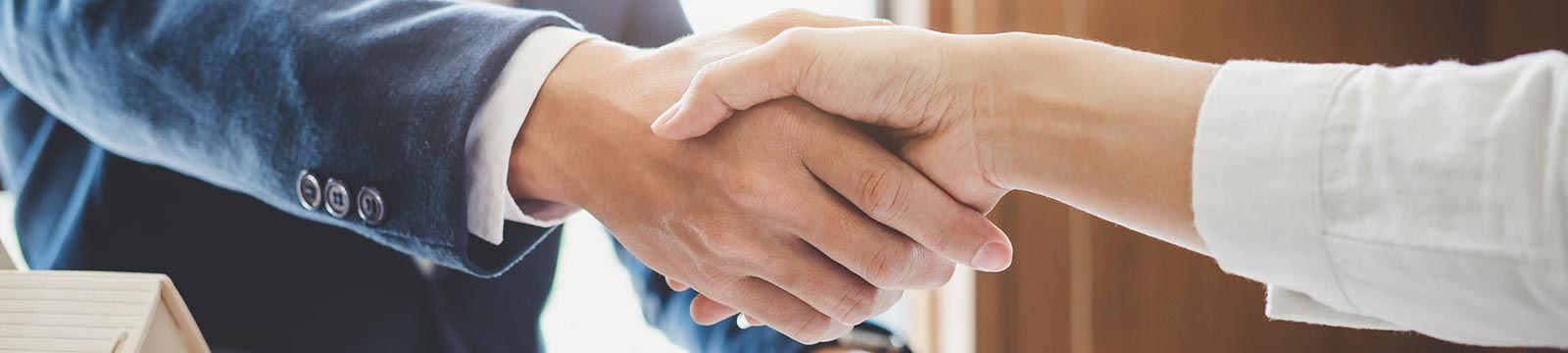 Close up of a handshake.